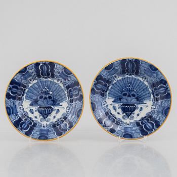 A pair of Peacock pattern earthenware plates, presumably De Klauw, The neatherlands, around 1800.
