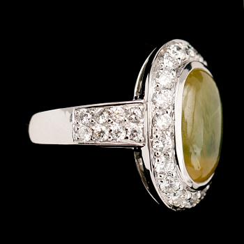 RING, 18 k vitguld, med safir 5.92 ct och briljanter tot 1.04 ct TW.