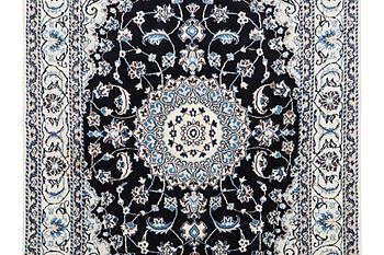 A carpet, Nain, part silk, c. 232 x 167 cm.