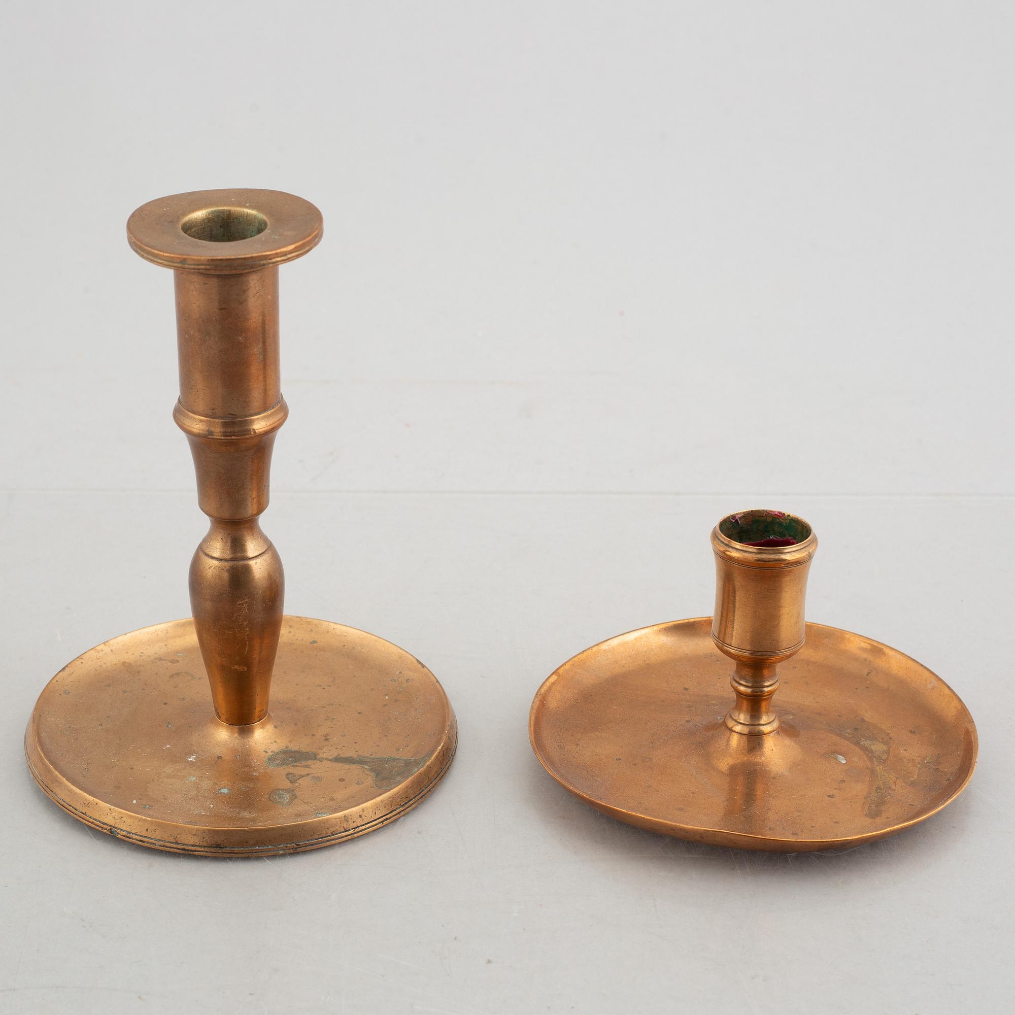Two brass candlesticks, 18th Century.
