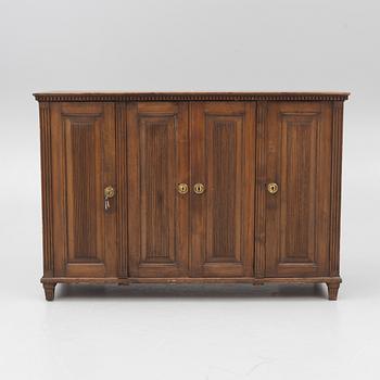 A Gustavian pine cupboard, late 18th century.