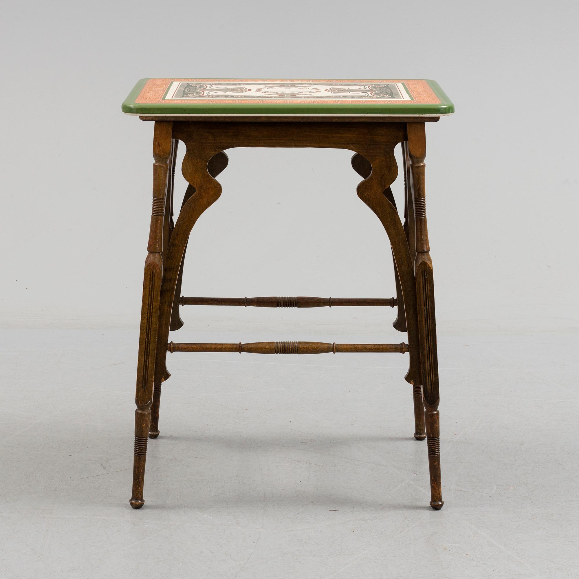 An early 20th century art nouveau table.