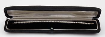 A platinum bracelet set with round brilliant-cut diamonds with a total weight of ca 3.75 cts.