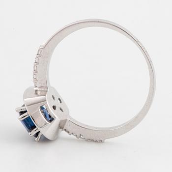 18K white gold and sapphire and brilliant-cut diamond cluster ring.