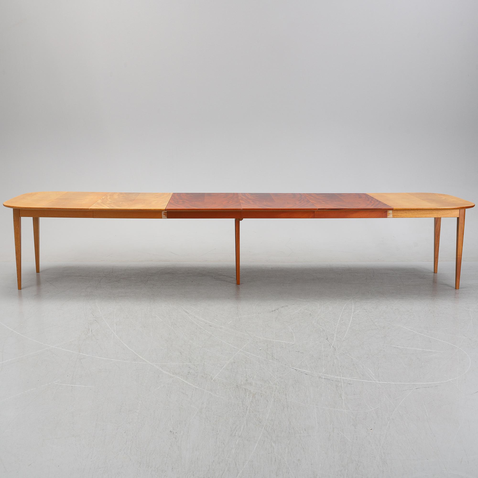 Josef Frank, a model '947' mahogany veneered dinner table for Firma Svenskt Tenn.
