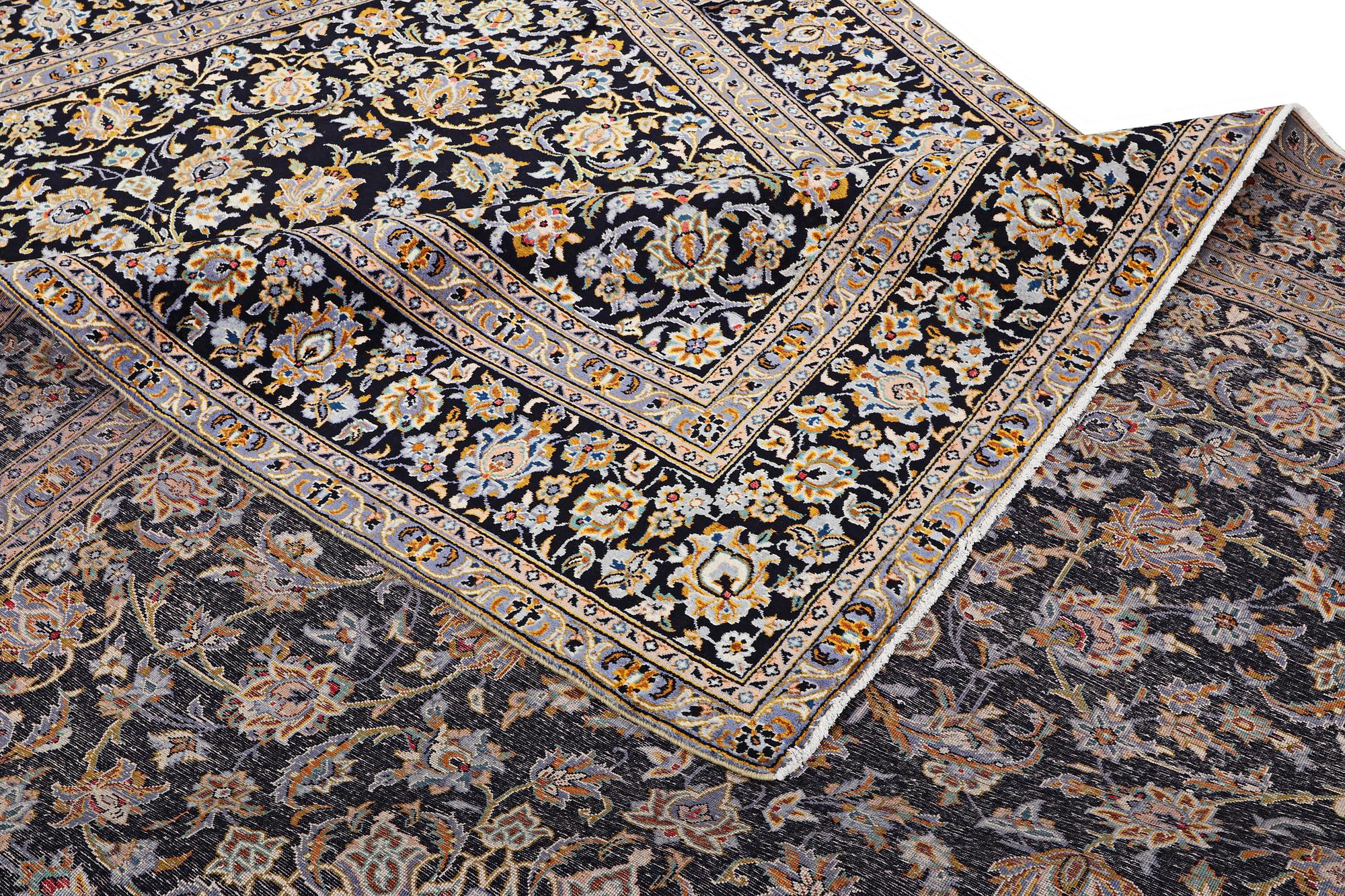 A Kashan carpet, signed, c. 410 x 270 cm.