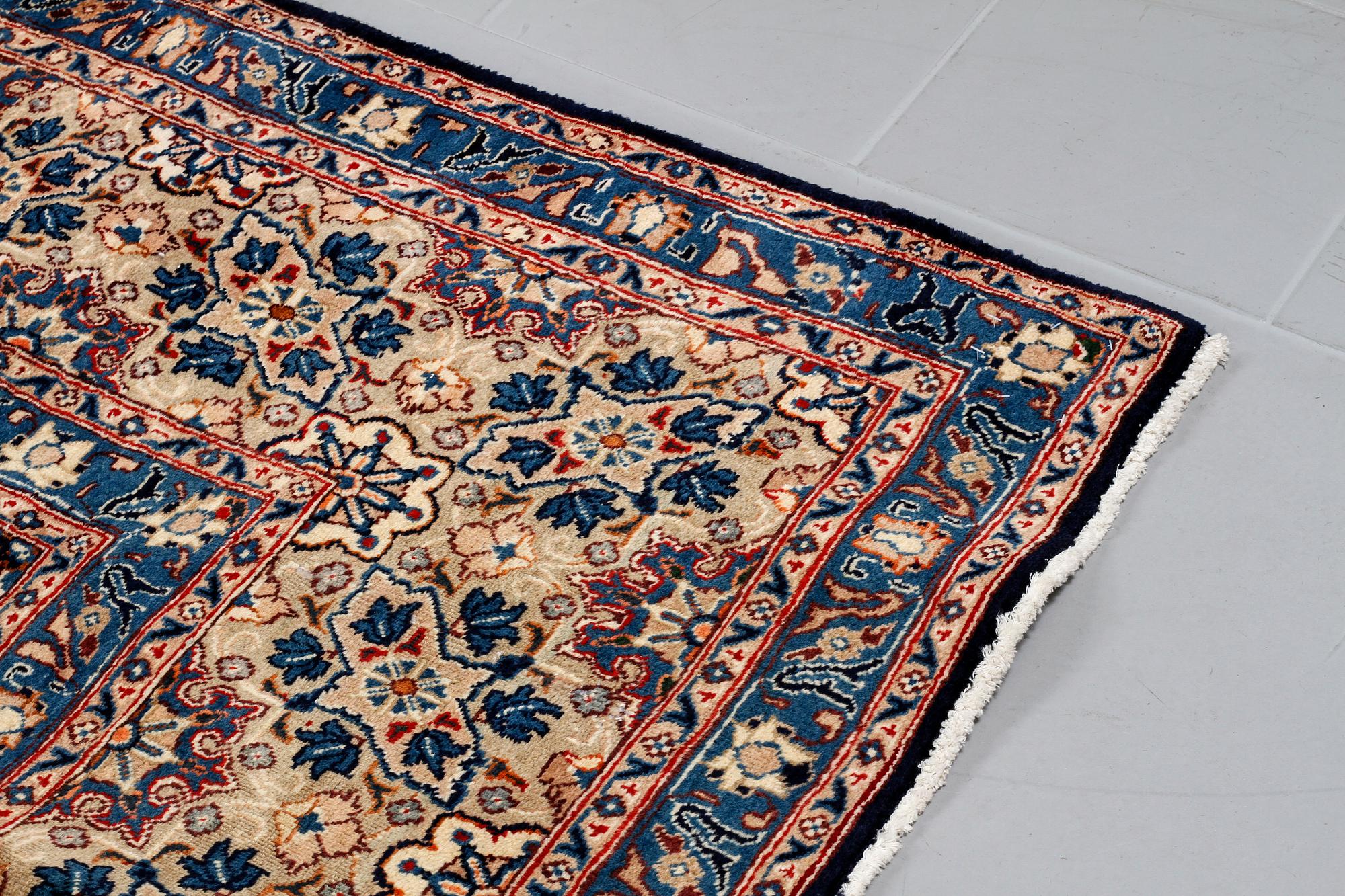 A KASHMAR RUG, 385 x 297 cm.