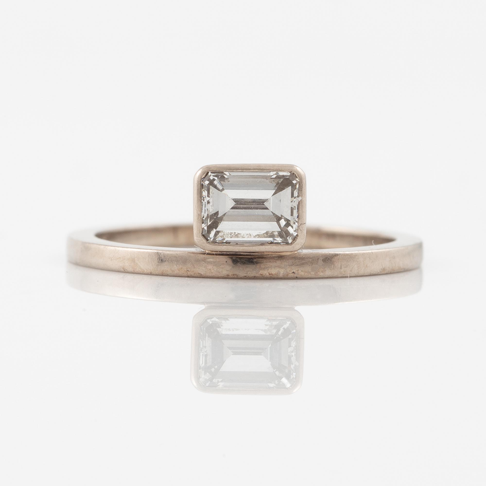 Ring, 14K white gold with emerald-cut diamond.