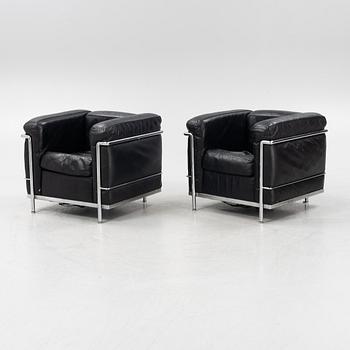 Le Corbusier, Pierre Jeanneret & Charlotte Perriand, a pair of 'LC2' easy chairs, Cassina.