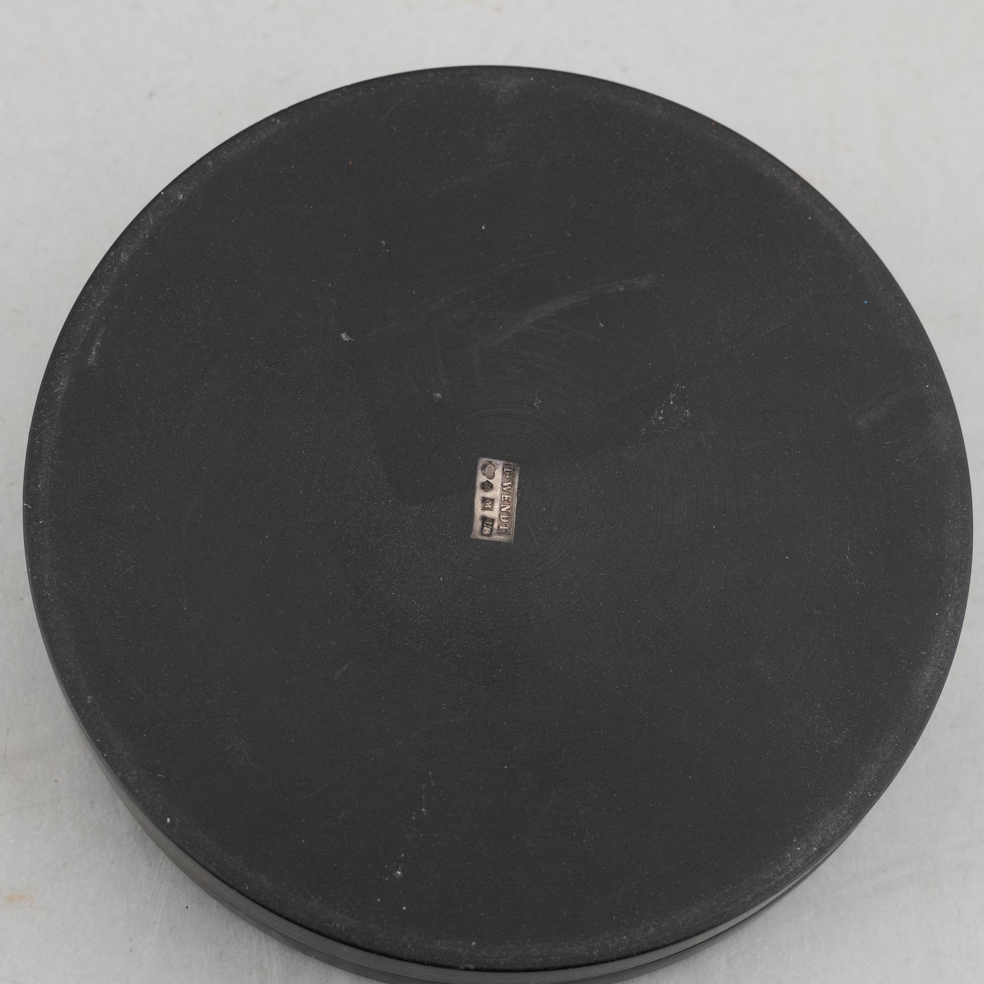 Eight coasters, Isolit with silver inlays, 1937-53.