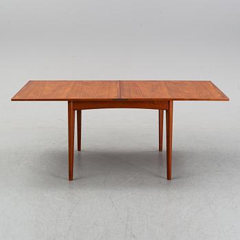A teak dining group, table and six chairs model no. 49, designed by Erik Buch, Denmark, in 1949.