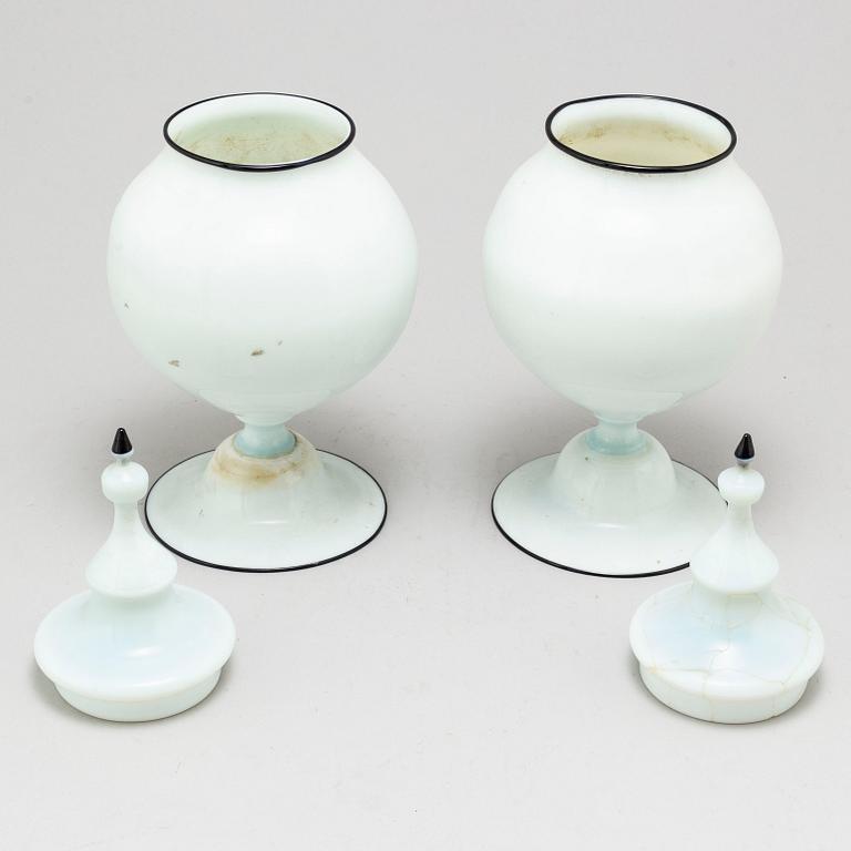 A pair of late 19th century glass urns.