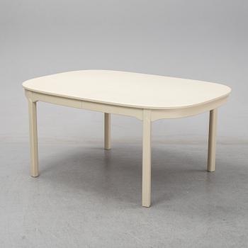A second half of the 20th Century 11 pcs dining set by Carl Malmsten. Åfors möbelfabrik.