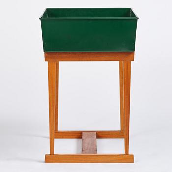 Josef Frank, a rare flower table with green lacquered box model B 2084, Firma Svenskt Tenn, 1950-60s.