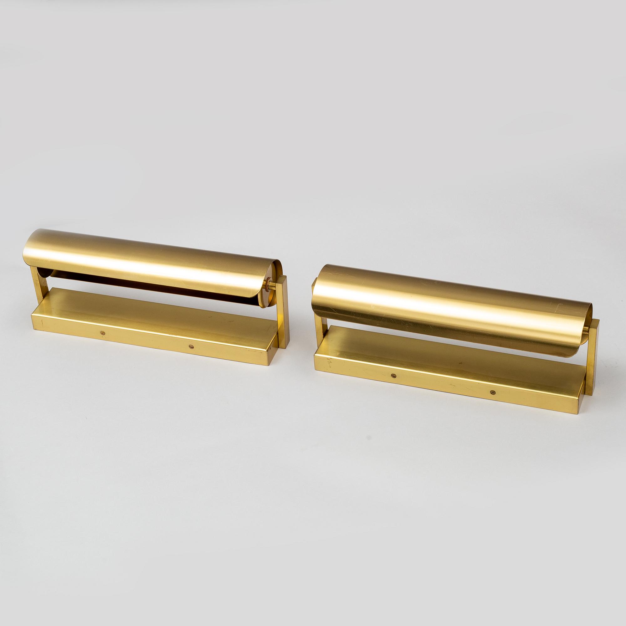 NORDISKA KOMPANIET, a pair of brass wall lights, second half of the 20th Century.