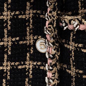 Chanel, a bouclé jacket size 34.