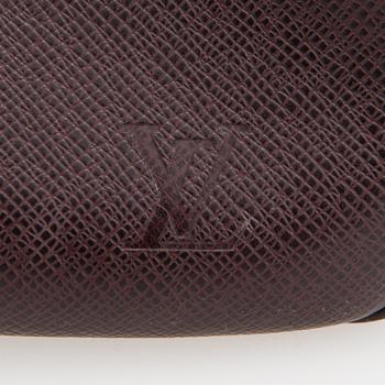 Louis Vuitton, 'Taiga Kendall PM' Bag.