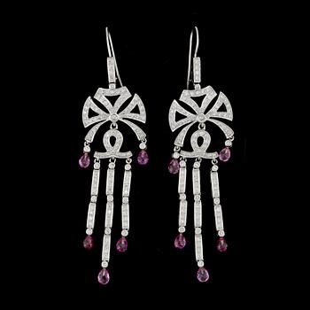 186. A pair of diamond and pink sapphire earrings.