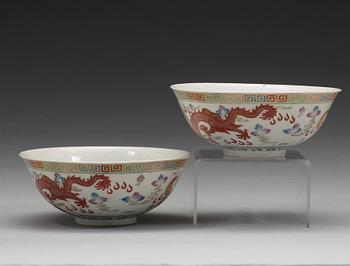 A pair of dragon and phoenix bowls, China, Republic with Qianlong mark.