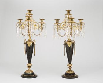 KANDELABRAR för fyra ljus, ett par. Svart marmor och förgylld brons.  Oscarianska 1800-talets slut.