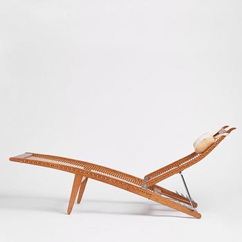 Hans J. Wegner, an oak lounge chair model "JH 524", Johannes Hansen, Copenhagen.