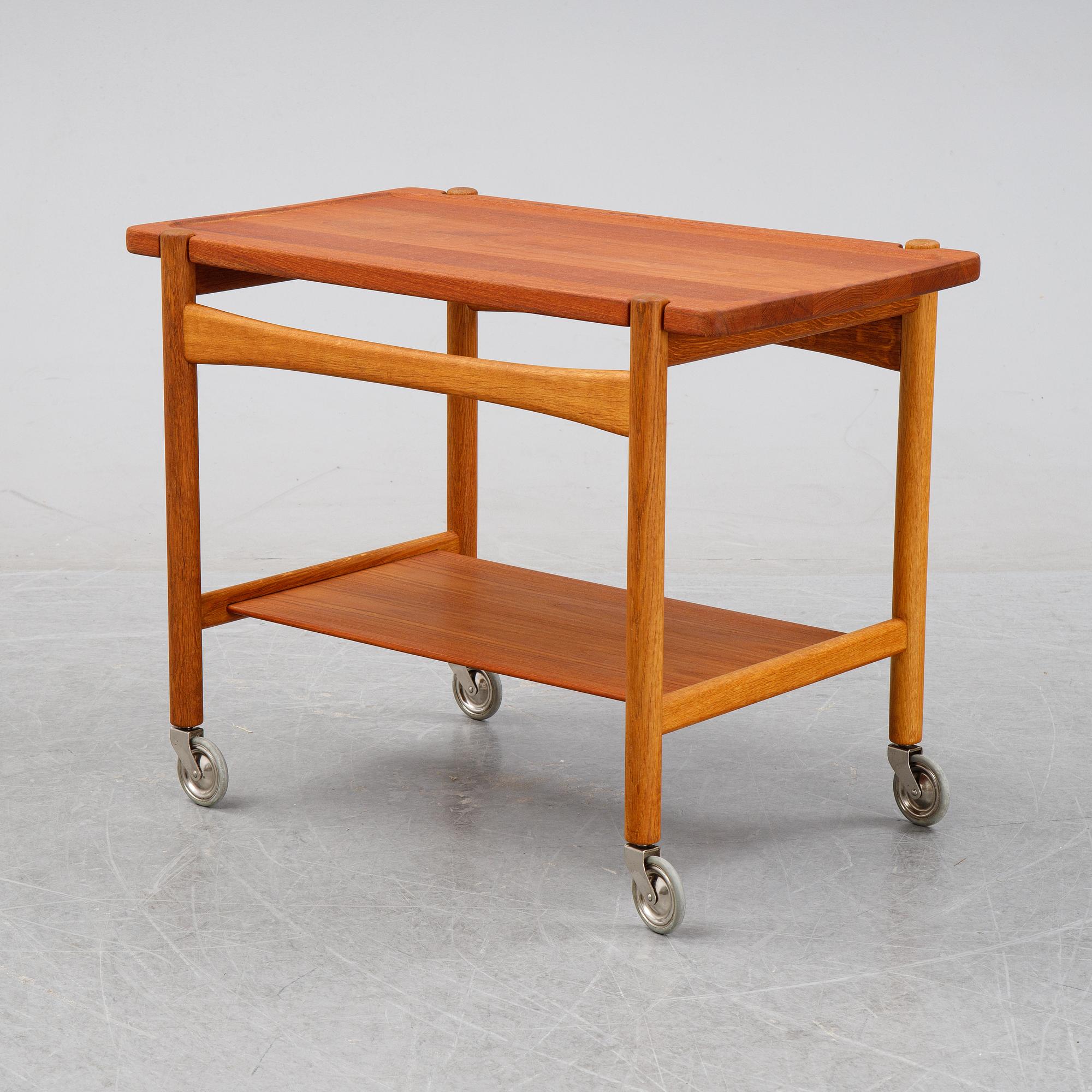 Hans J Wegner, a teak serving trolley, for för Andreas Tuck, Denmark, mid 20th century.