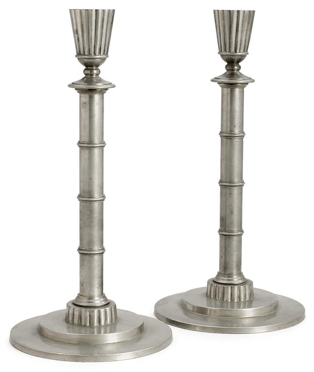 A pair of Erik Fleming pewter candlesticks by Norrahammars Bruk, Sweden 1930.