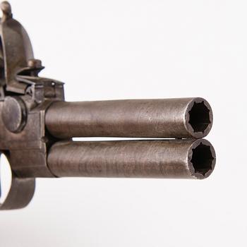 A late 18th Century, probably British double-barrelled flintlock pistol.