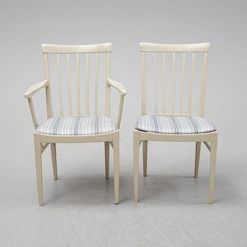 A dining table with two armchairs and six chairs by Carl Malmsten for Bodafors.