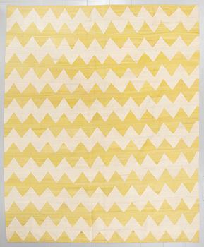 A flatweave rug, 300 x 260 cm.