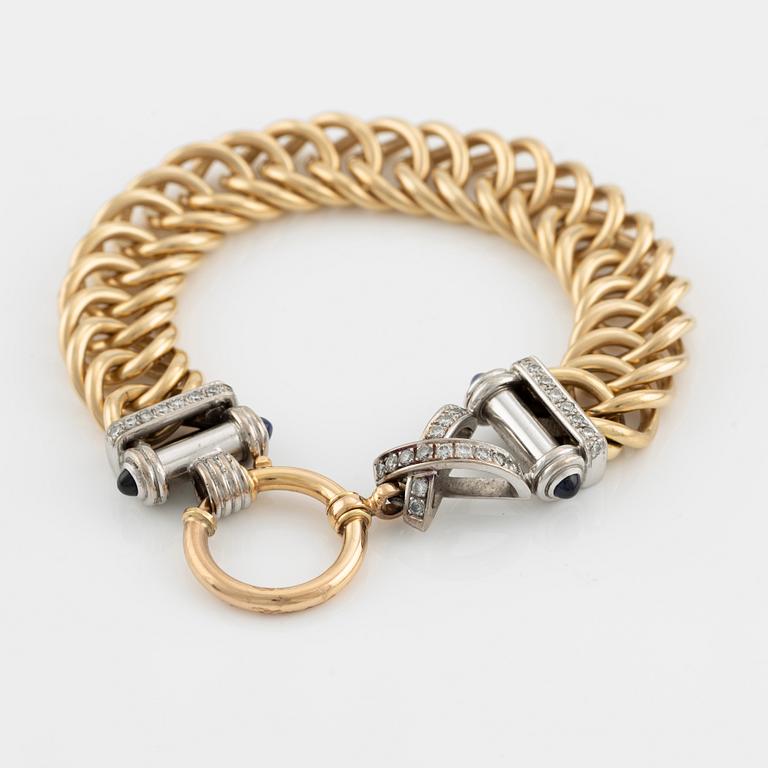 Armband 18K guld med runda briljantslipade diamanter samt safirer.