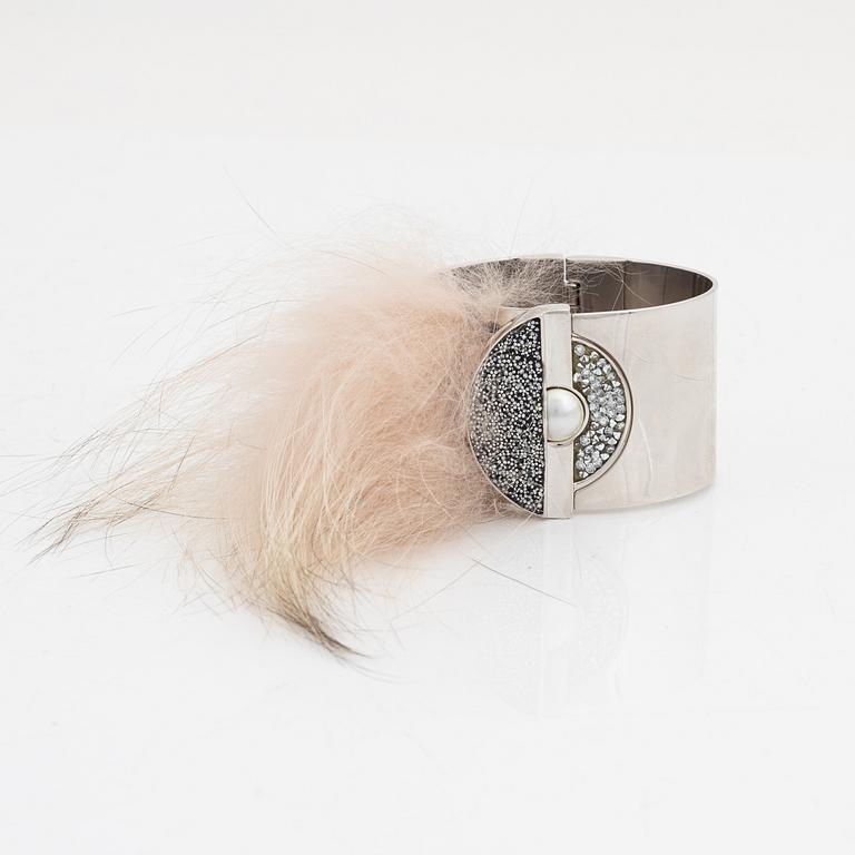 Fendi, a silvertone metal, rhinestone and fur bracelet.