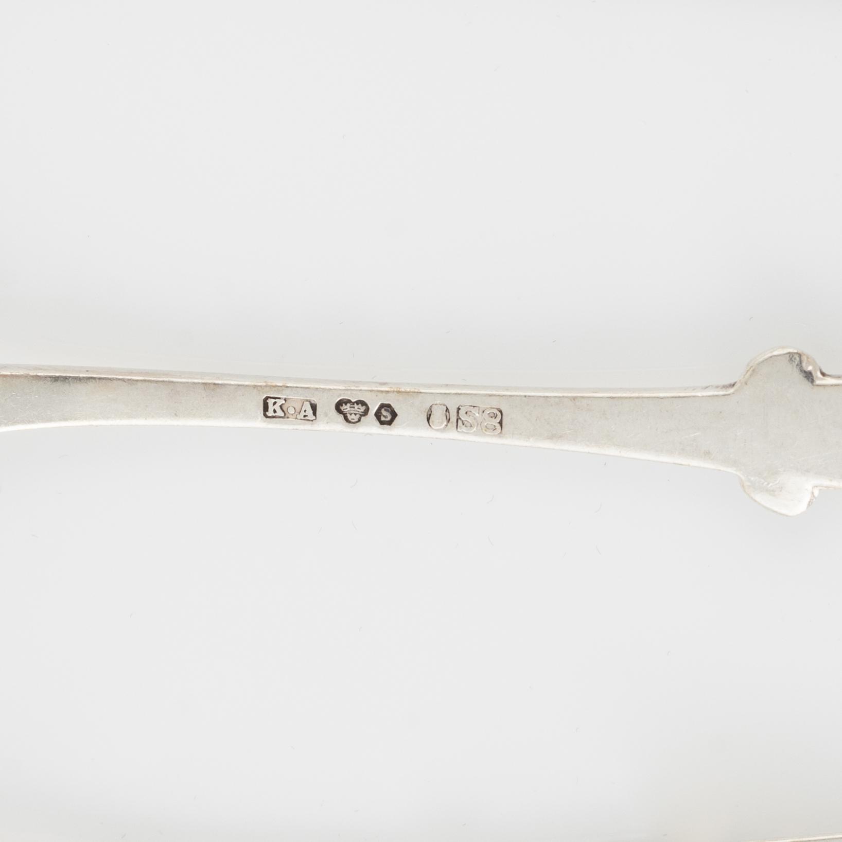 Bestick, brevkniv samt bägare, silver, bl a CG Hallberg Stockholm 1919 (24 delar).