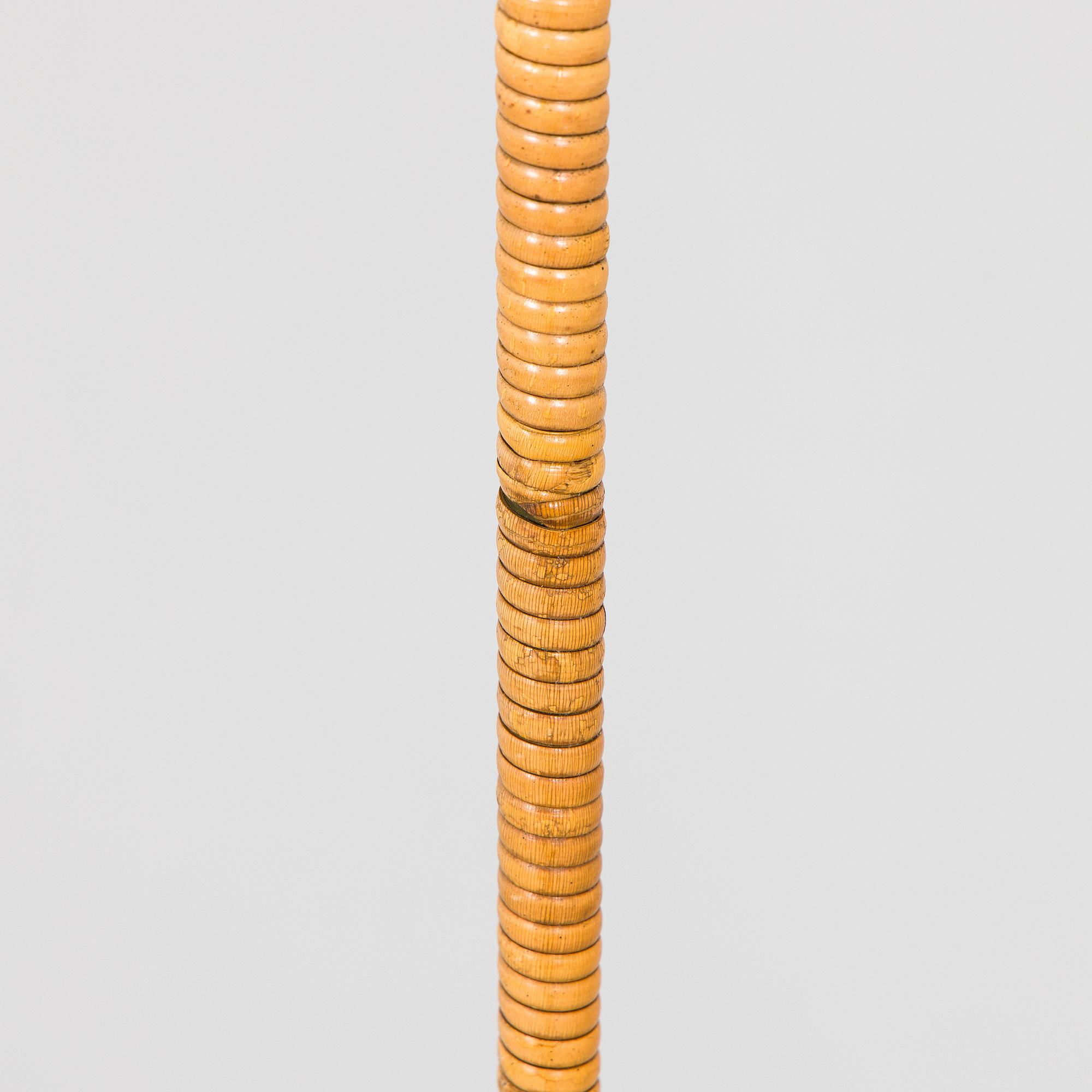 Paavo Tynell, a pair of mid-20th century K10-10 floor lamps for Taito Finland.