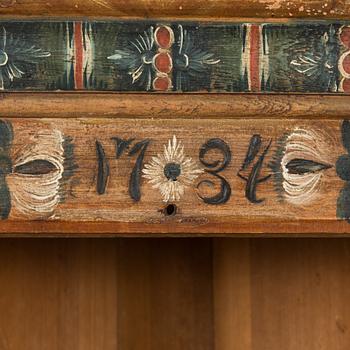 A Swedish corner cabinet from Dalarna dated 1734.