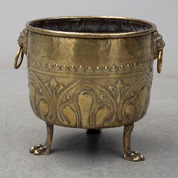 An 18th century brass flower pot.