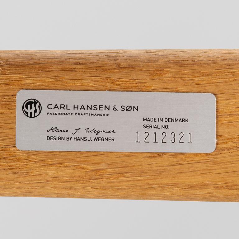 Hans J. Wegner, a CH26 chair, Carl Hansen & Son, Denmark, 21st century.