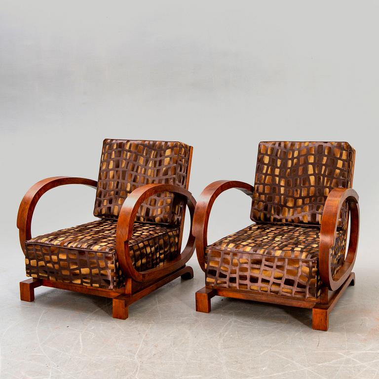 A pair of Art Deco easy chairs.