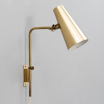 A wall light manufactured by Taito.