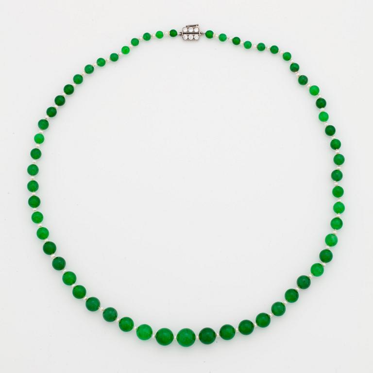 A NECKLACE with jadeite beads.