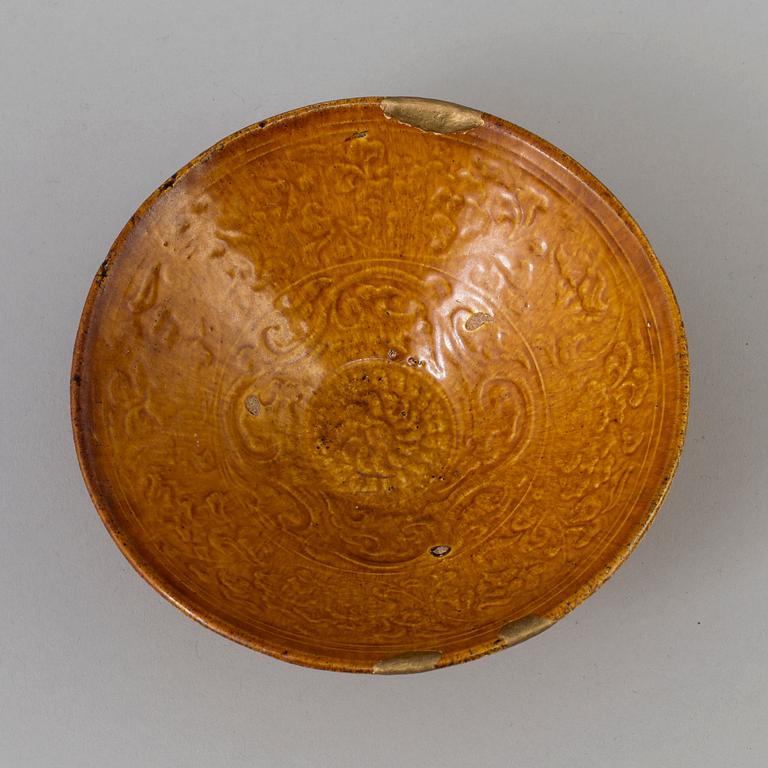 A Chinese yellow-glazed ceramic bowl, Liao dynasty (916-1225).