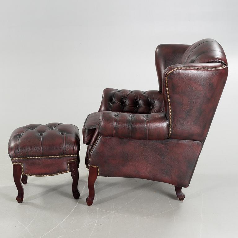 ARMCHAIR with STOOL, Chesterfield model, "Möbel Art", 20th century later part.