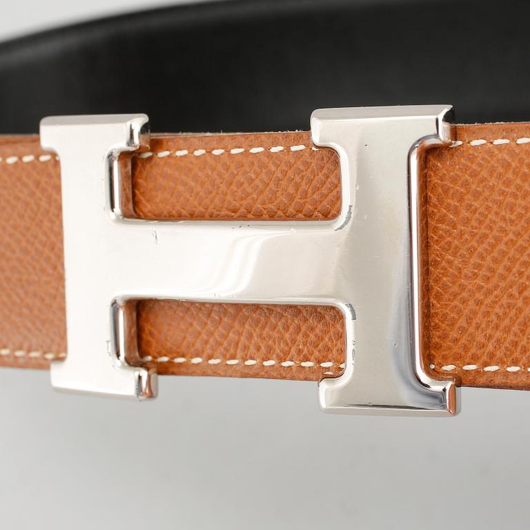 A leather belt from Hermès.