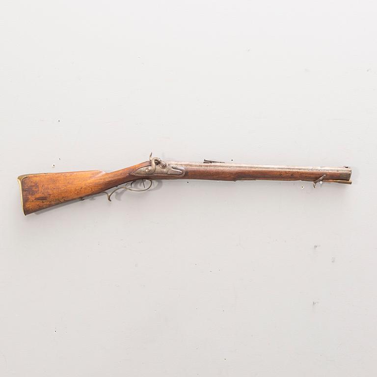 A percussion shotgun, carbine, 19th Century.