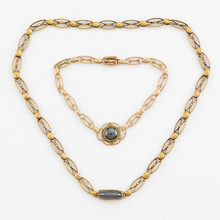 Necklace and bracelet, 18K gold and hematite, partly 19th century.