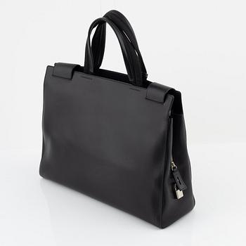 Prada, a black leather bag.