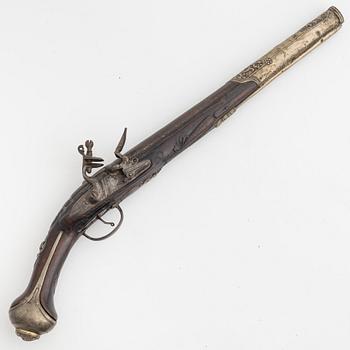 A 18th Century flintlock pistol.