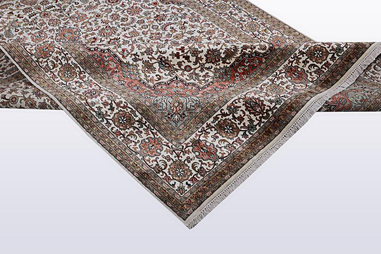 A carpet, silk Kashmir, ca 260 x 172 cm.