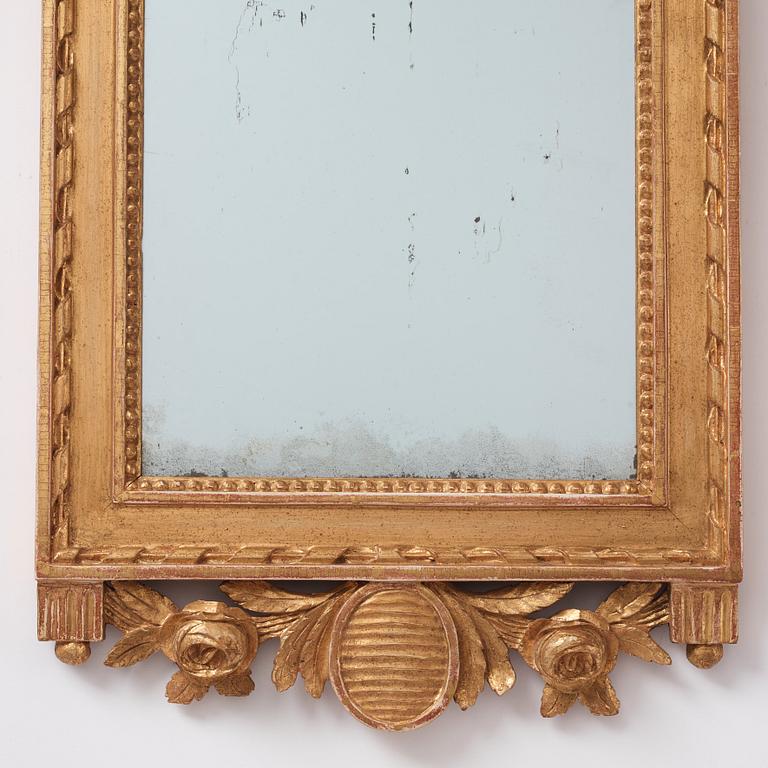 A Gustavian mirror, late 18th century.