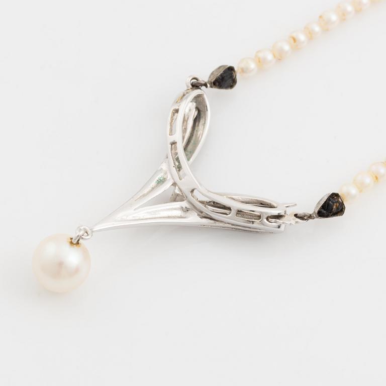 Necklace and earrings, a pair, cultured pearls, white gold, and brilliant- and octagon-cut diamonds.